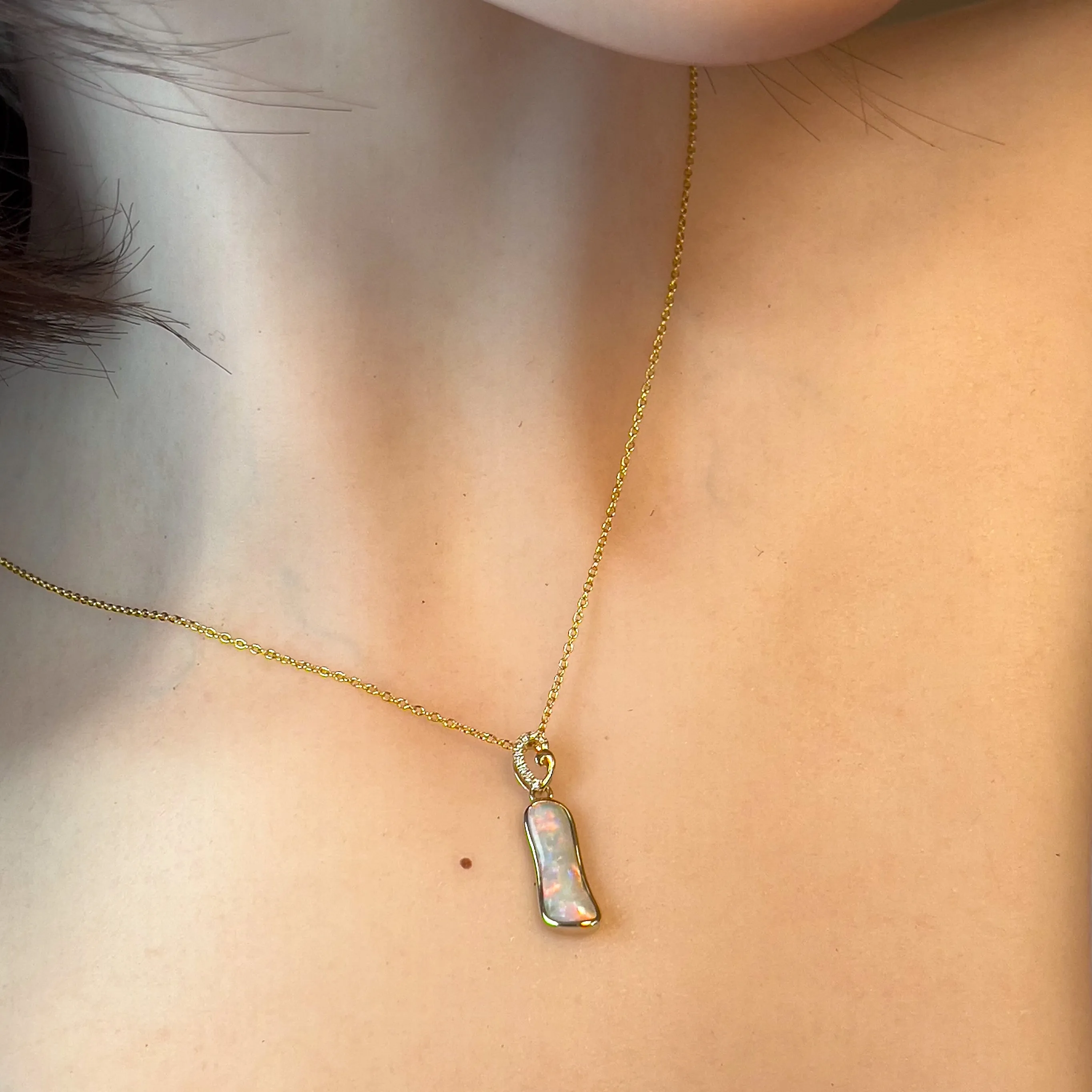 14kt Yellow Gold freeform Crystal Opal 1.05ct and diamond pendant
