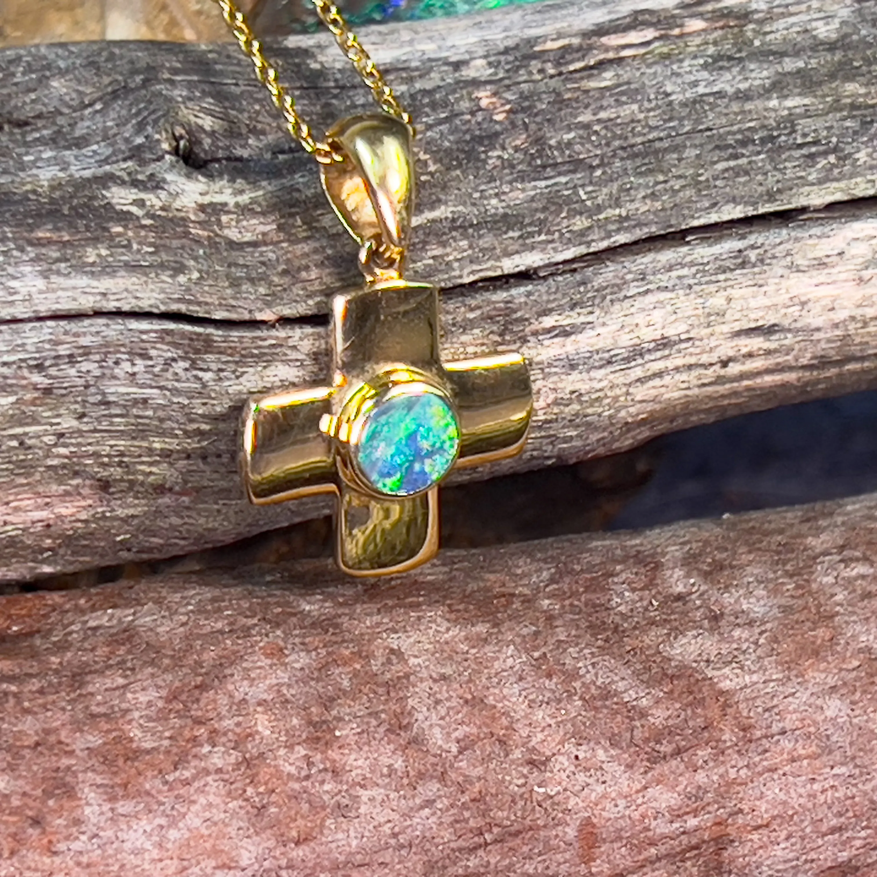 18kt Yellow Gold Black Opal 0.4ct cross pendant