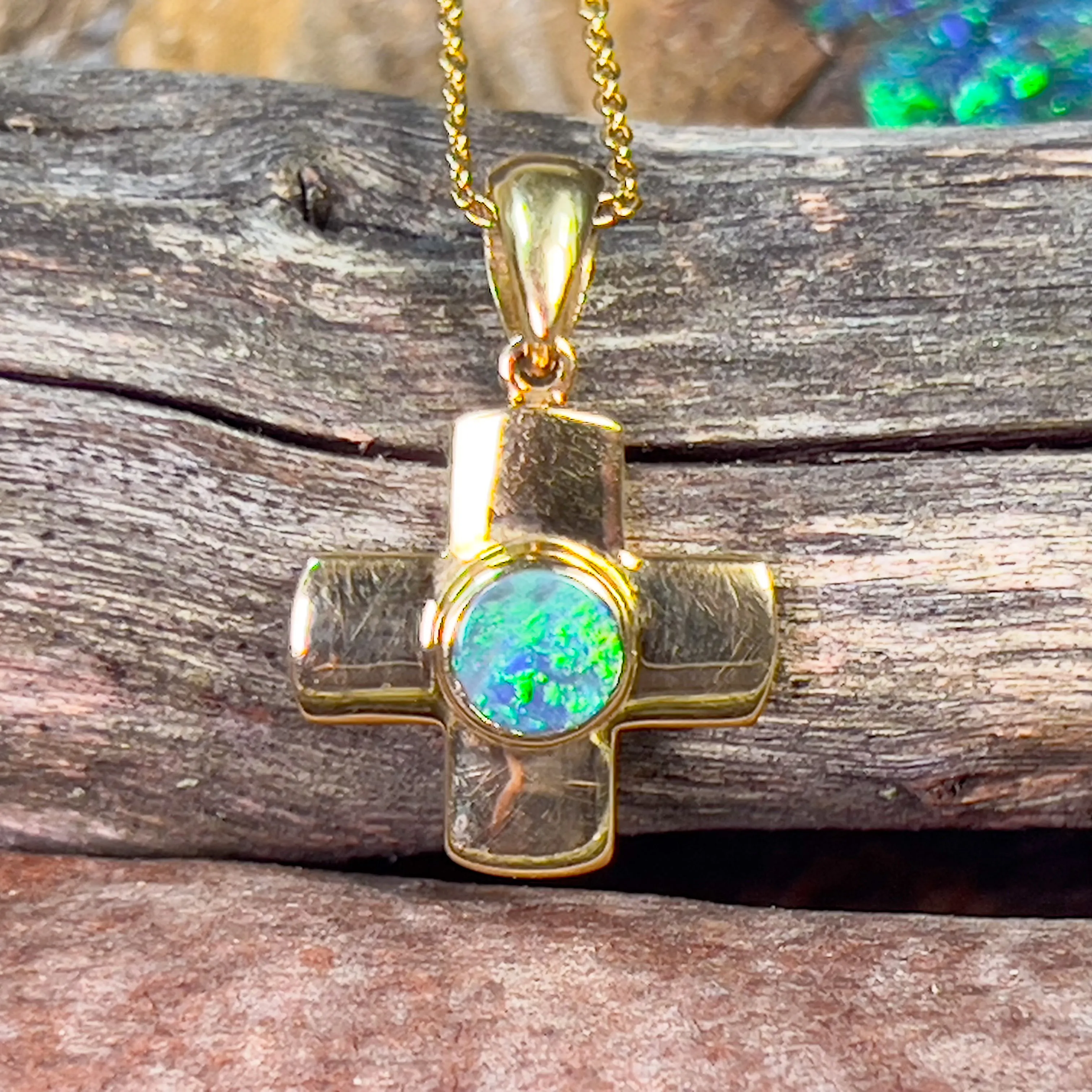 18kt Yellow Gold Black Opal 0.4ct cross pendant