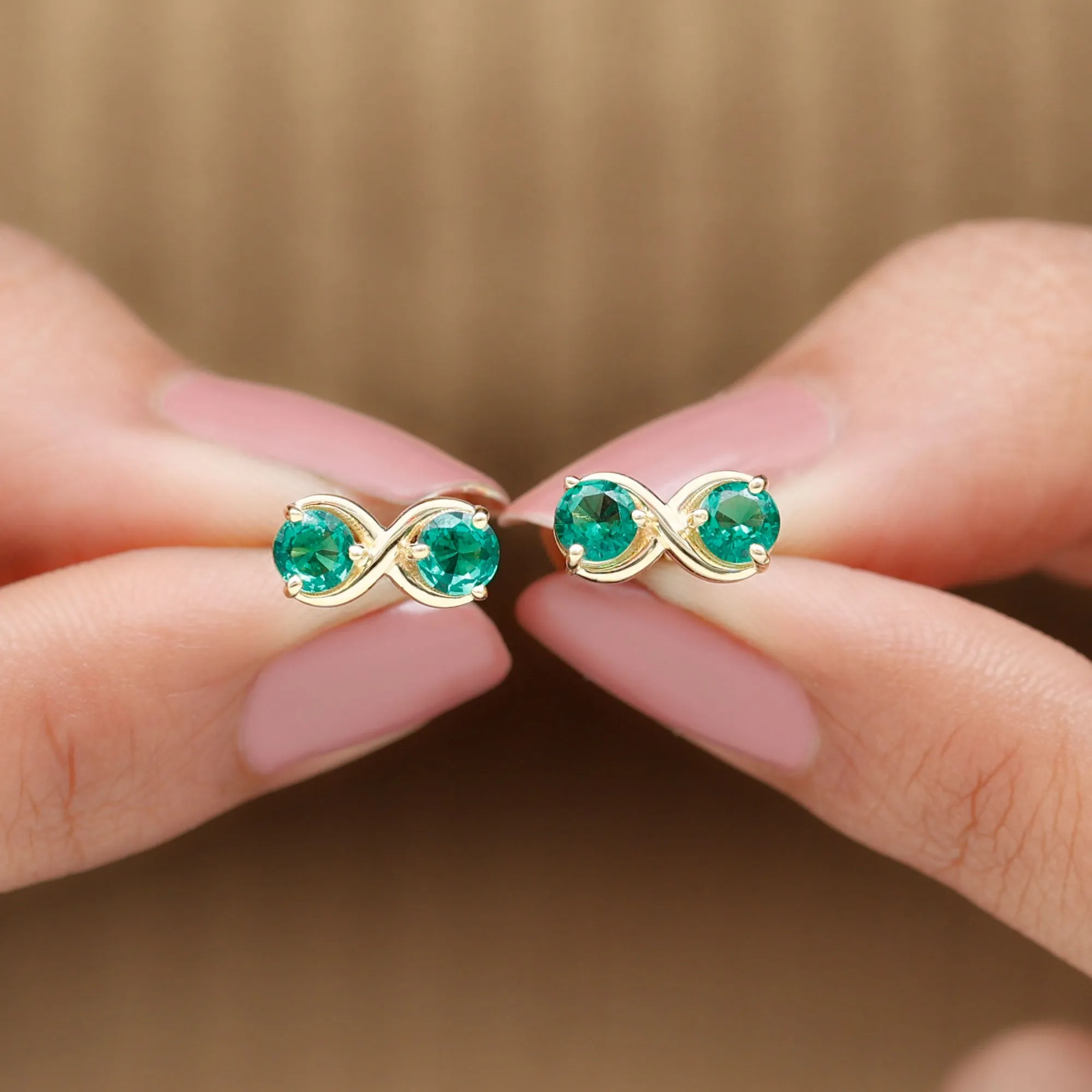 Two Stone Lab Grown Emerald Infinity Stud Earrings